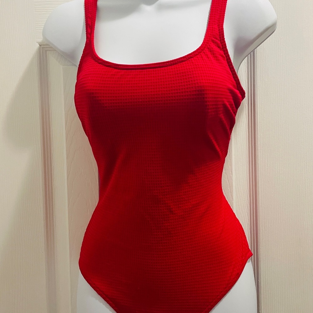 Flattering pink Baltex sz 12 one-piece